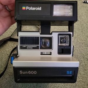 Retro Polaroid Sun 600 SE camera with filter
